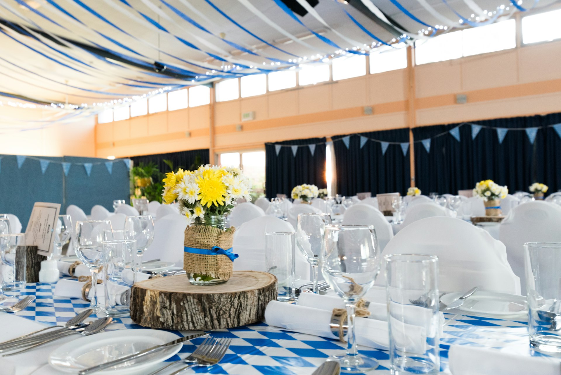 Gather House homepage: warm wood community venue with a full-bleed interior video and the wordmark Gather House over soft amber light.