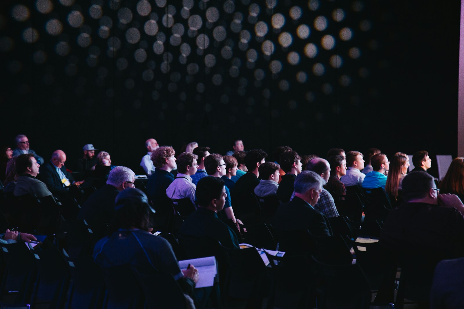 Conference seating under warm stage light