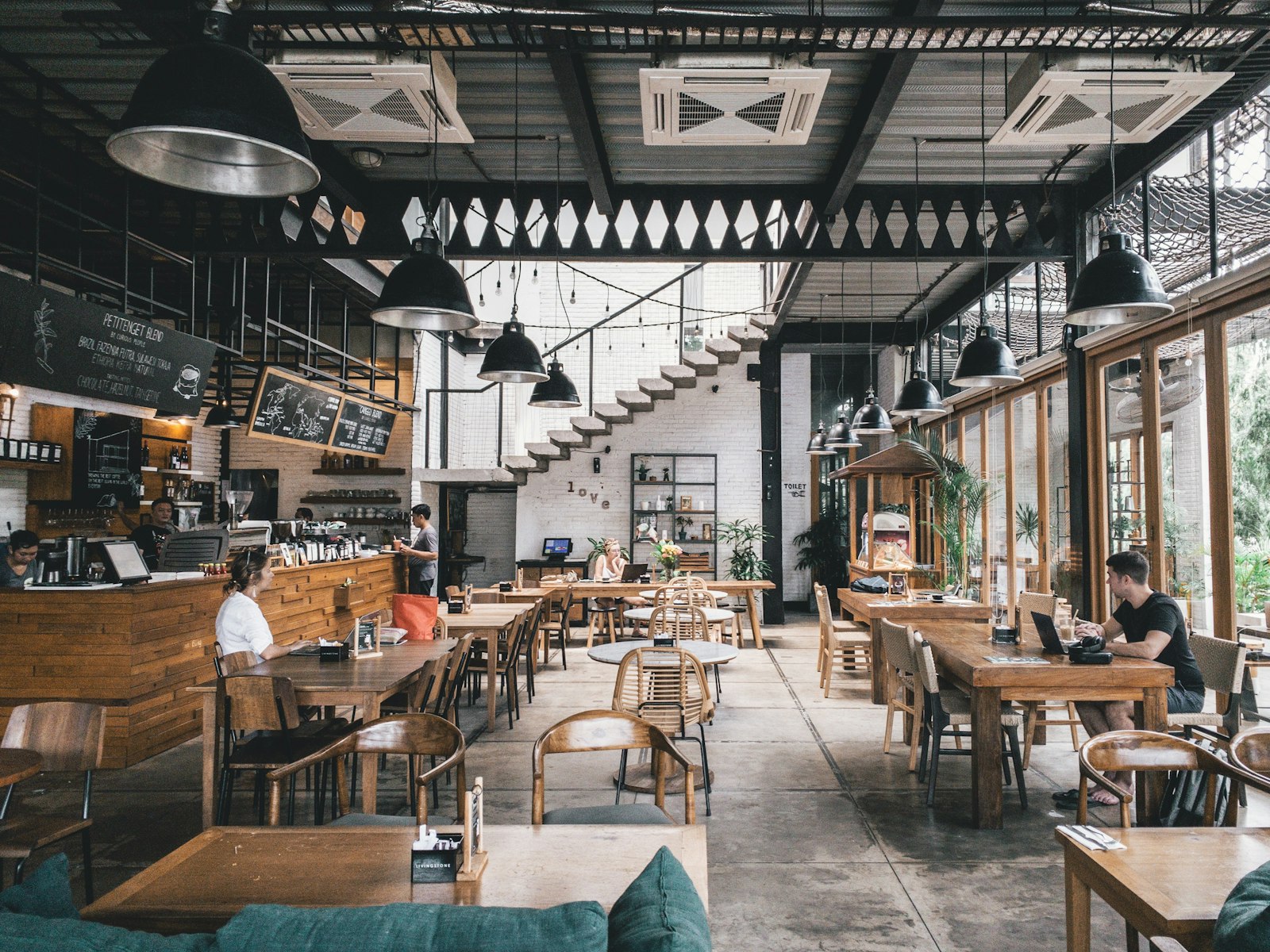 Restaurant corner with hanging plants