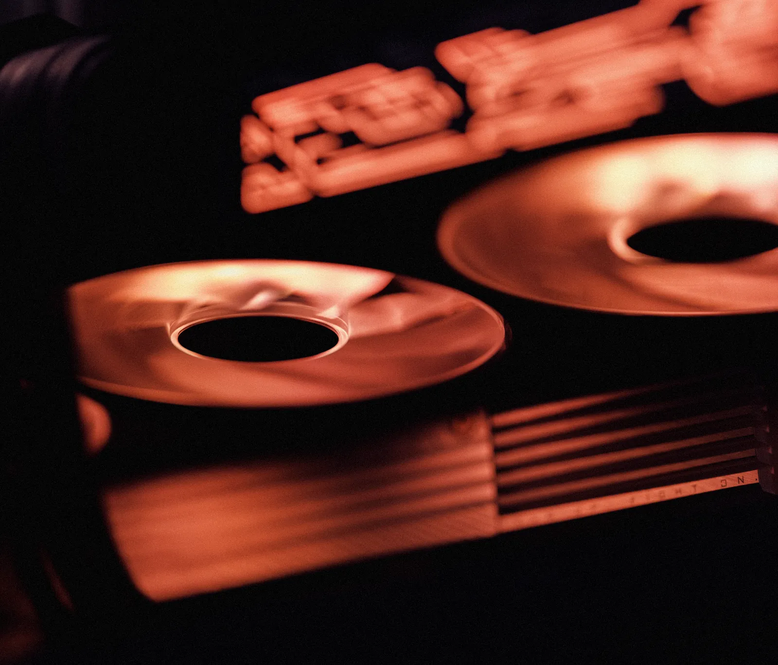 The GX9900's fans lit copper-red inside the case.