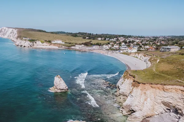 Chalk cliffs and a bay on the Isle of Wight from the air